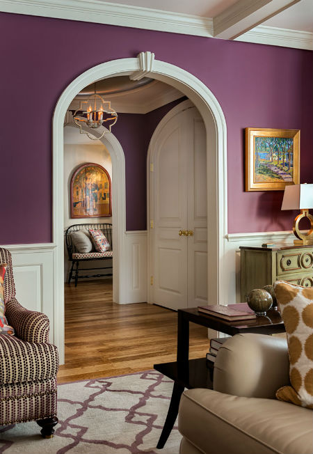 Arched  dooreays gracefully lead into the main portion of the home. Source:  Karosis Photography