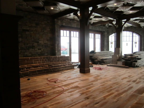 Inside the ding room where the unfinished walnut floor will get an oil-rubbed finish. Source:  TMS Architects
