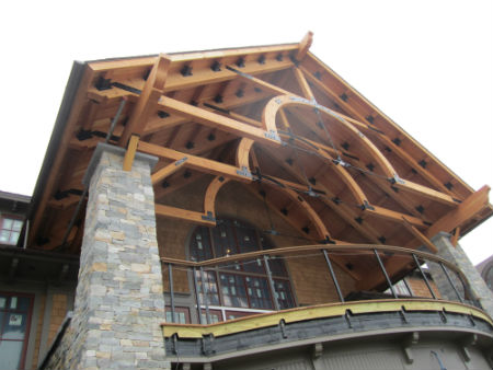 The west deck with its heavy timber trusses and metal turnbuckles. Source:  TMS Architects